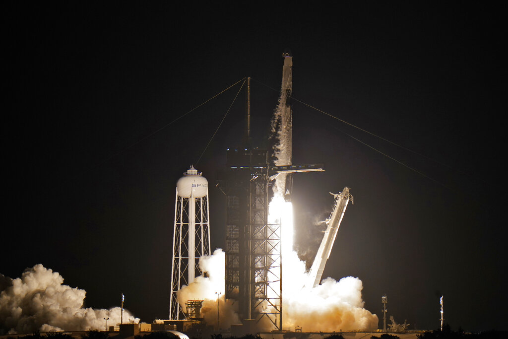 SpaceX launches four amateurs on private Earth-circling trip