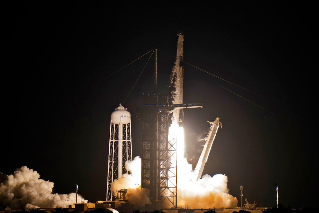 SpaceX launches four amateurs on private Earth-circling trip