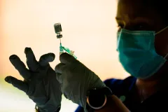 FDA vaccine panel approves Pfizer booster shots for people over 65 after rejecting it for younger adults