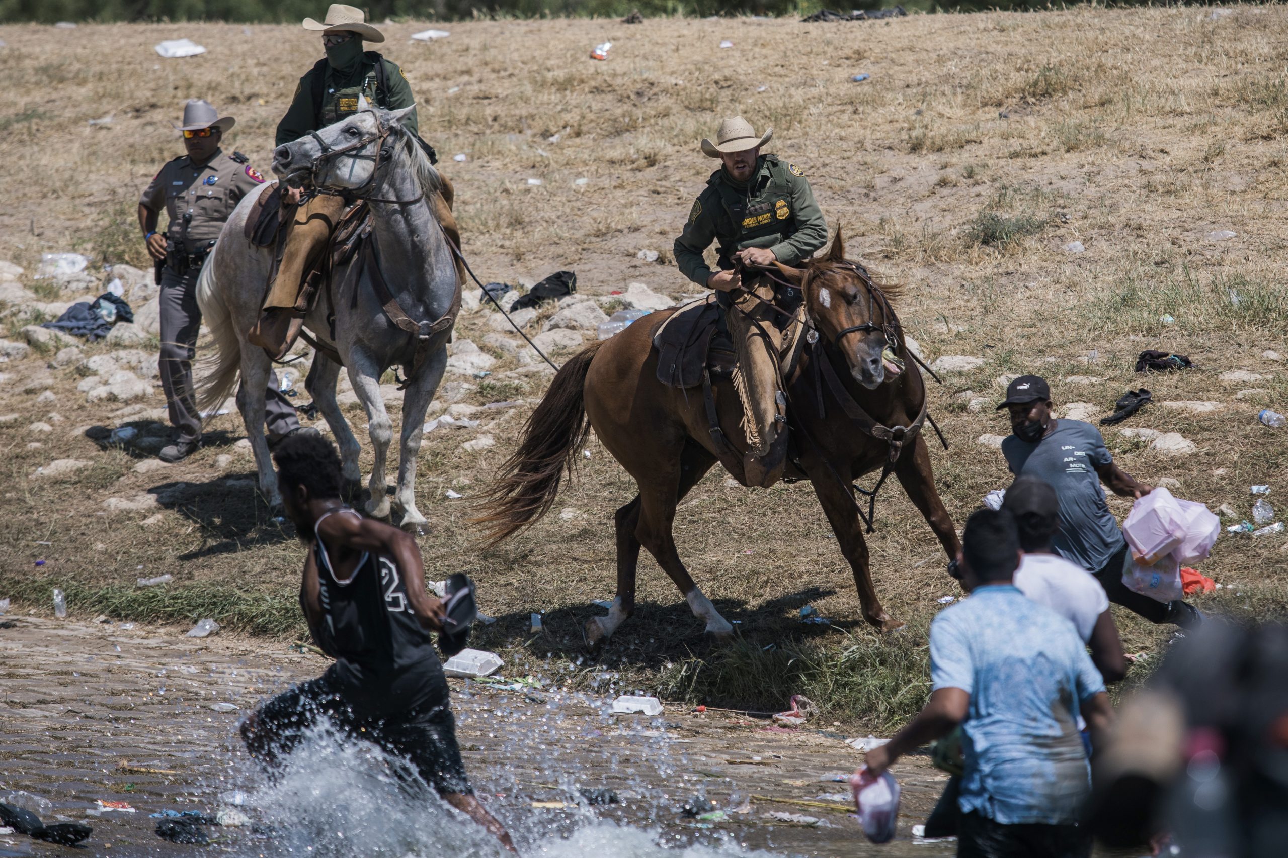 Border Patrol agents on horseback
