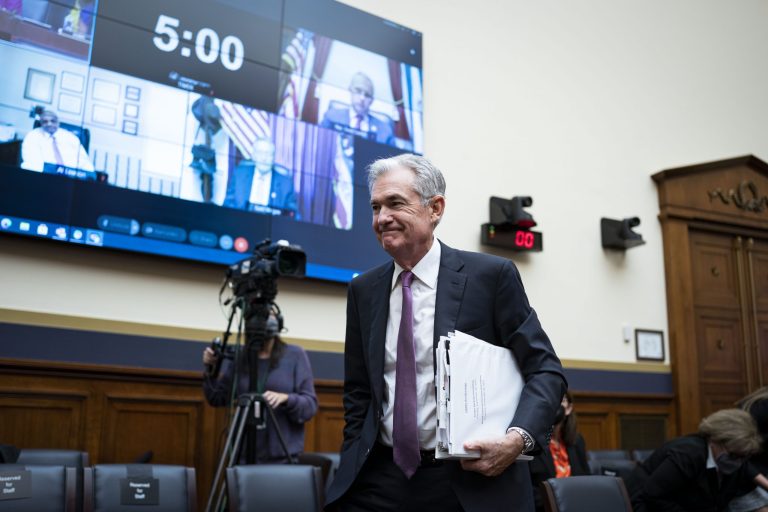 Federal Reserve Chairman Jerome Powell leaves after testifying during a House Financial Services Committee hearing on Sept. 30.