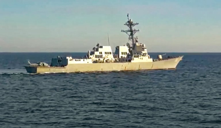 Russia says it pushed US destroyer from area near its waters