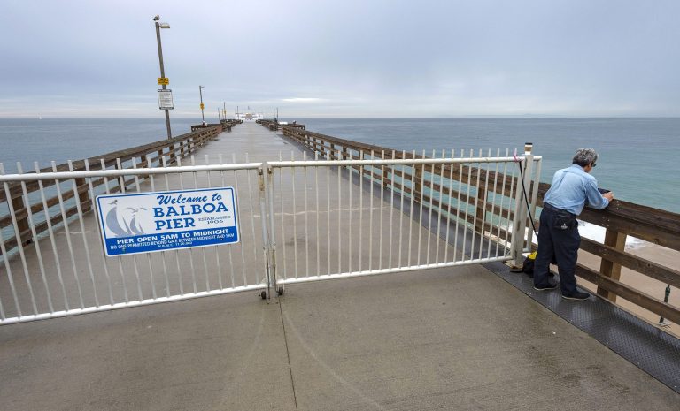 Pacific tsunami threat recedes, volcano ash hinders response