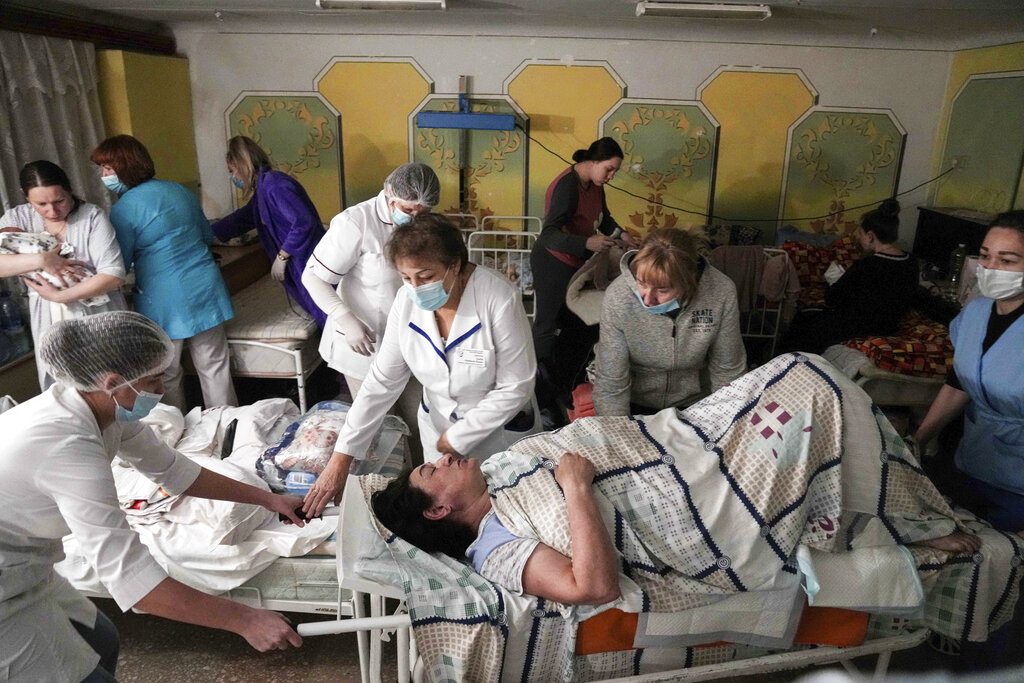 Humanitarian convoy sent to Mariupol targeted by Russian gunfire, Ukraine says