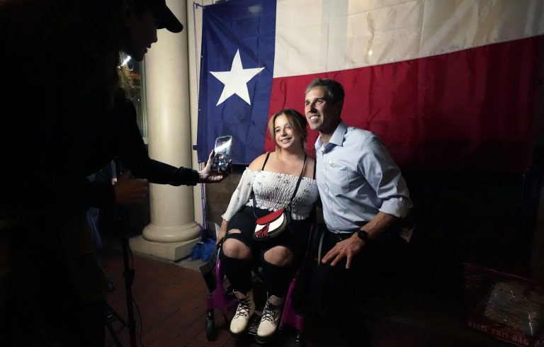 Texas Democrat gubernatorial candidate Beto O'Rourke, right, takes a photo with Miranda Alfaro during a primary election night gathering in Fort Worth, Texas, Tuesday, March 1, 2022. 