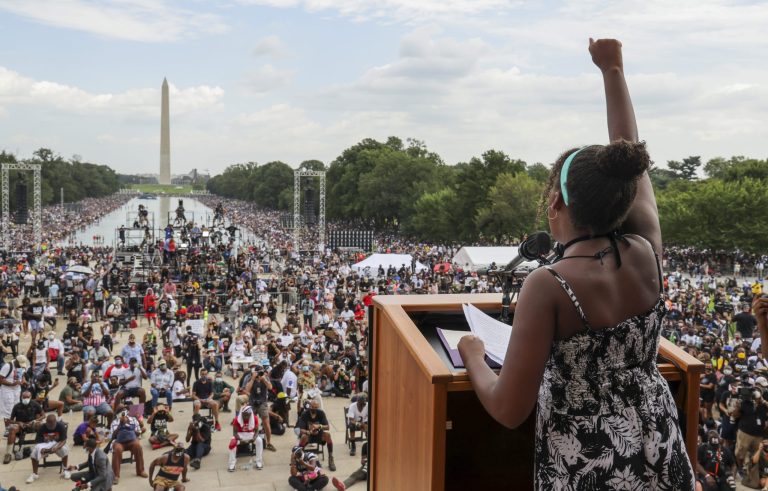 FILE - Yolanda Renee King, granddaughter of The Rev. Martin Luther King Jr., raises her fist as she speaks during the March on Washington, on the 57th anniversary of the Rev. Martin Luther King Jr.'s 