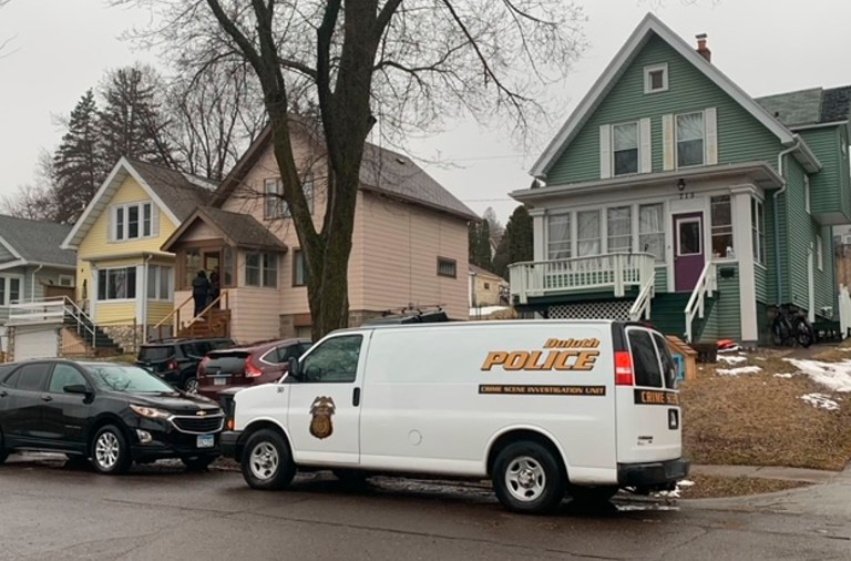 Police respond to a home on Wednesday, April 20, 2022 in Duluth, Minn. Five people were found dead inside the home after police received a report of a male experiencing a mental health crisis, authorities said. The dead included the male reported to be in crisis.