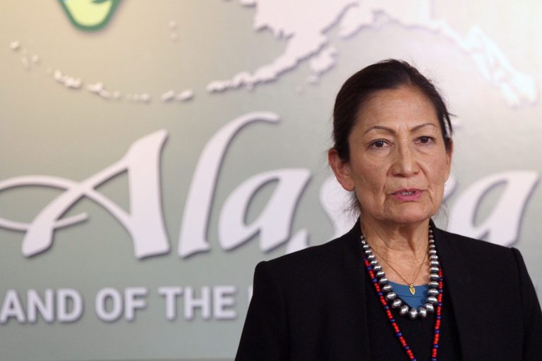 Interior Secretary Deb Haaland addresses reporters during a news conference Thursday, April 21, 2022, in Anchorage, Alaska. Haaland is in the midst of a visit to the state that included a trip to King Cove, a community at the center of a long-running dispute over a proposed land exchange aimed at building a road through a national wildlife refuge.