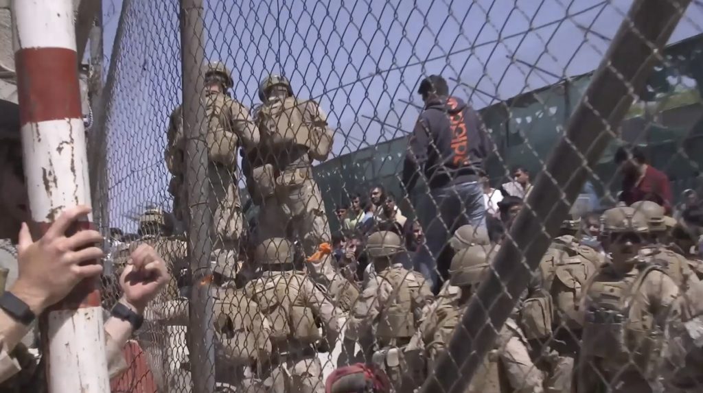 This image from a video released by the Department of Defense shows U.S. Marines at Abbey Gate before a suicide bomber struck outside Hamid Karzai International Airport on Aug. 26, 2021, in Kabul, Afghanistan.
