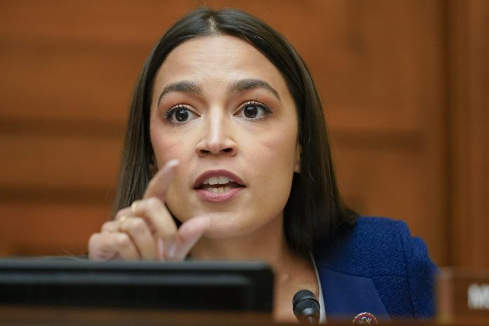 Rep. Alexandria Ocasio-Cortez, D-N.Y., speaks during a House Committee on Oversight and Reform hearing on gun violence on Capitol Hill in Washington, Wednesday, June 8, 2022. Ocasio-Cortez was slammed after she mocked Supreme Court Justice Brett Kavanaugh for being chased out of a restaurant. (AP Photo/Andrew Harnik, Pool)