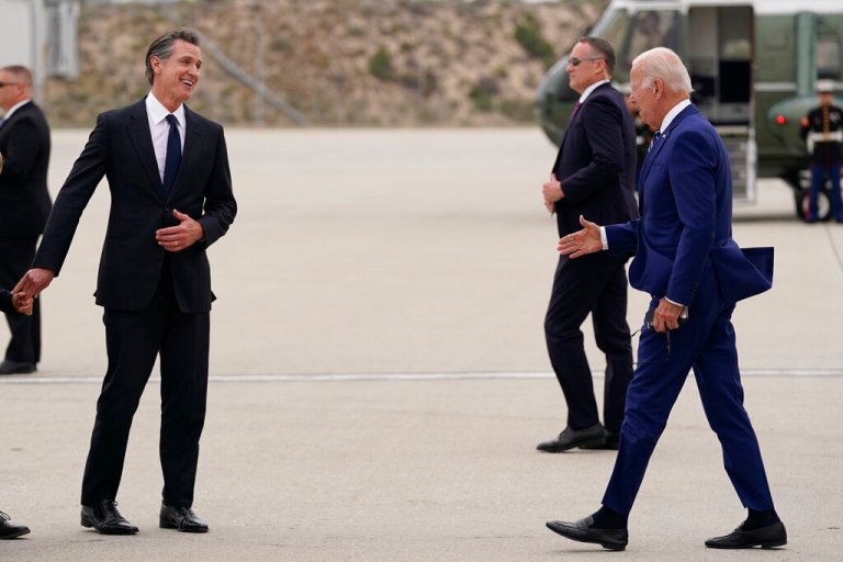 Biden and Newsom survey California storm damage