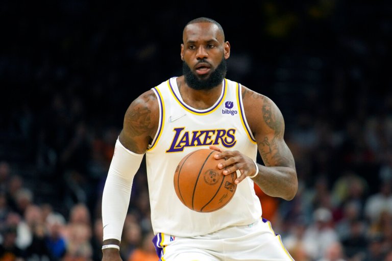 FILE -Los Angeles Lakers forward LeBron James (6) during the first half of an NBA basketball game against the Phoenix Suns, Sunday, Jan. 13, 2022, in Phoenix. LeBron James and Naomi Osaka are becoming teammates in the entertainment world. Tennis star Osaka and her agent and business partner, Stuart Duguid, are forming a media company called Hana Kuma in partnership with The SpringHill Company, which was created by NBA star James and Maverick Carter, Tuesday, June 21, 2022.