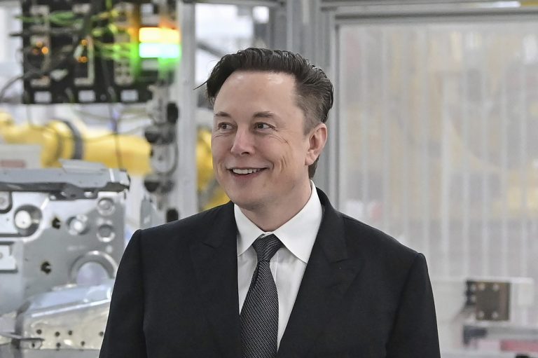 FILE - Tesla CEO Elon Musk attends the opening of the Tesla factory Berlin Brandenburg in Gruenheide, Germany, on March 22, 2022. The multi-billionaire mocked President Joe Biden on Friday, July 8, 2022, the same day he told Twitter he is terminating his deal to acquire the platform. (Patrick Pleul/Pool Photo via AP, File)