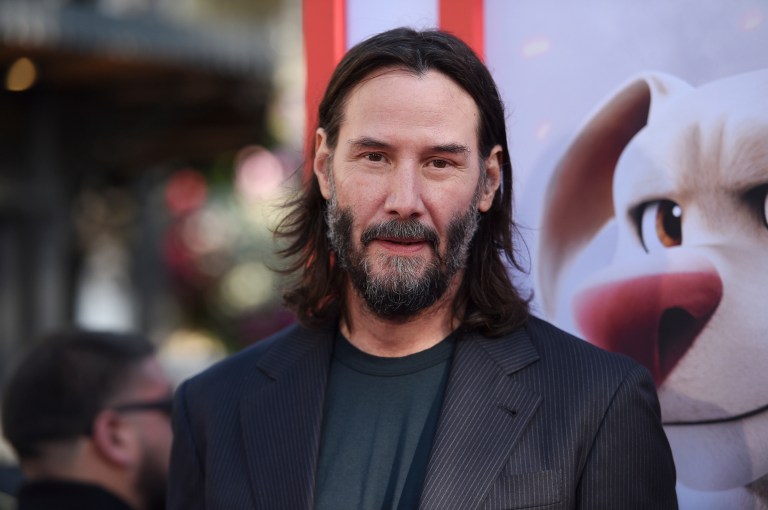 SEE IT: Keanu Reeves crashes wedding of British fans