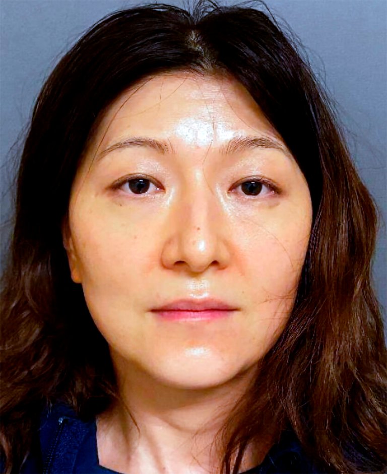 This photo provided by the Irvine Police Department shows 45-year-old Yue Yu.