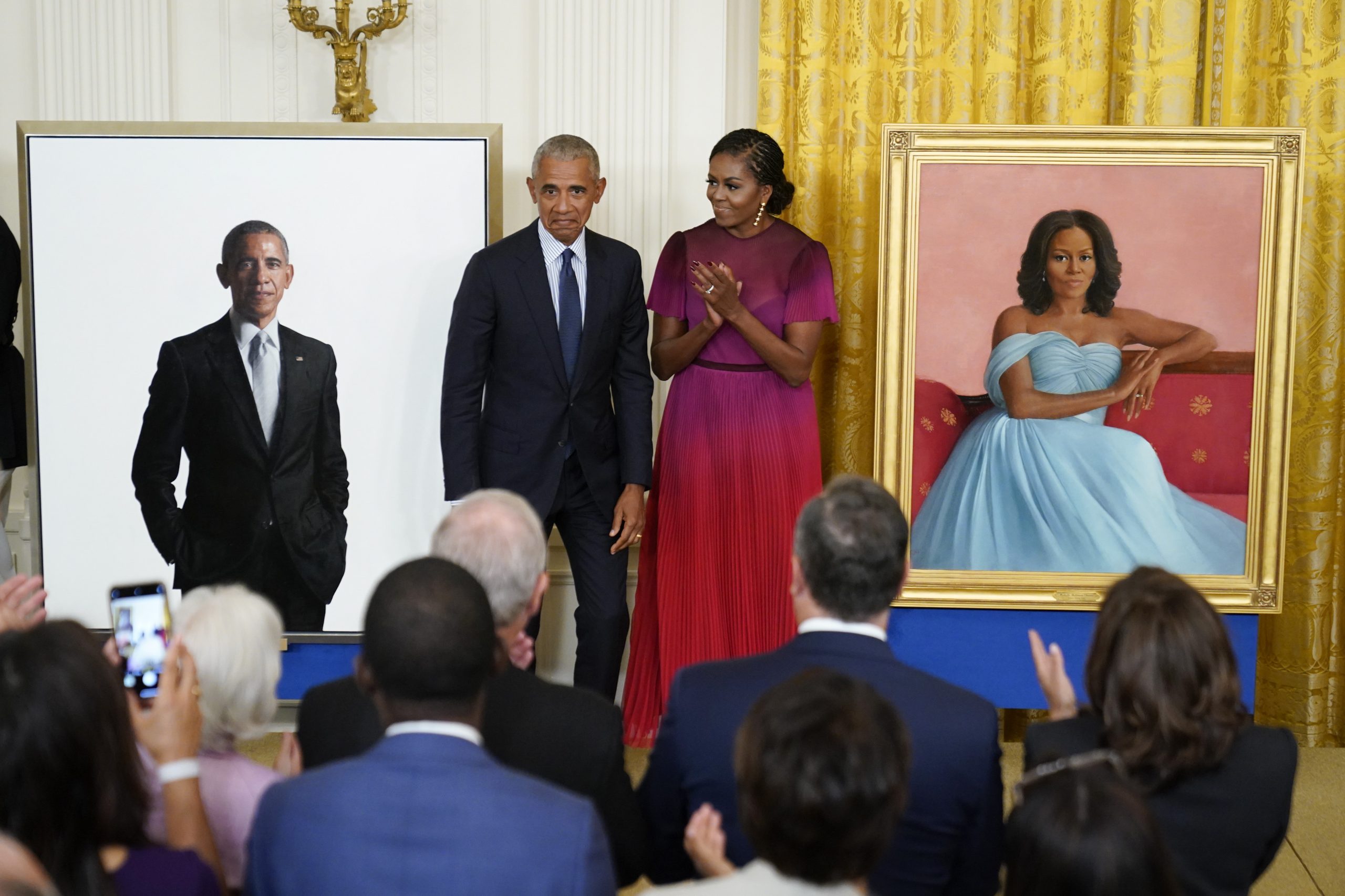 Obama embraces Biden during official White House portrait unveiling
