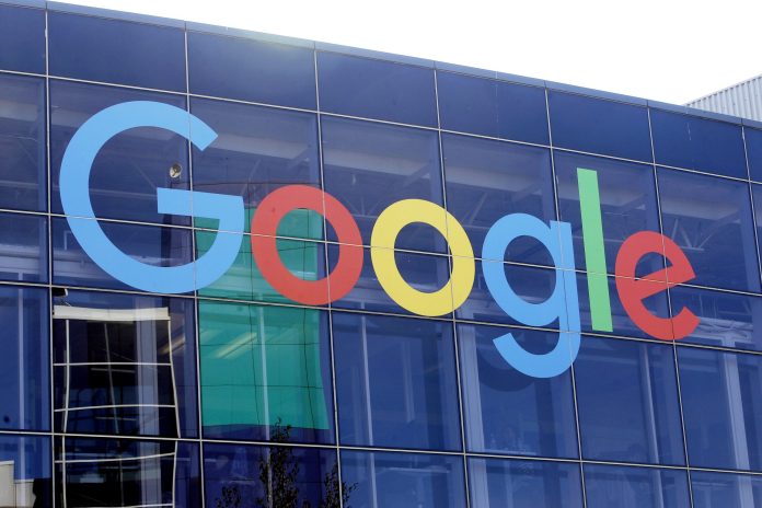 FILE - In this Sept. 24, 2019, file photo a sign is shown on a Google building at their campus in Mountain View, California. (AP Photo/Jeff Chiu, File)