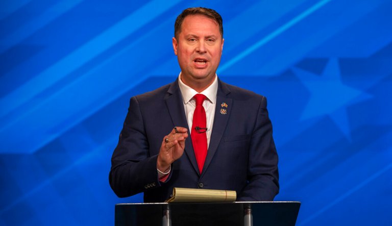 This image released by Maryland Public Television shows gubernatorial candidate Republican Dan Cox speaking during a debate with Democrat Wes Moore, Wednesday, Oct. 12, 2022, in Owings Mills, Md. 