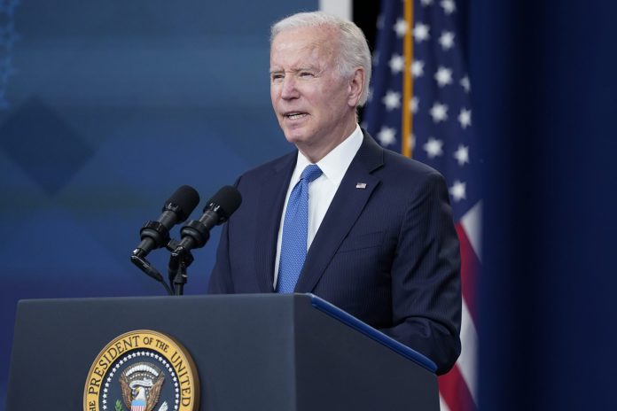 President Joe Biden speaks about the student debt relief portal beta test in the South Court Auditorium on the White House complex in Washington, Monday, Oct. 17, 2022. Biden experienced another mishap on camera when he spelled out "D-O-T" when telling people to report fraudulent calls regarding student aid forgiveness to reportfraud.ftc.gov. (AP Photo/Susan Walsh)