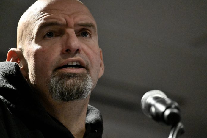 Lt. Gov. John Fetterman speaks onstage during a neighborhood rally at Temple University in North Philadelphia, Pennsylvania, on Oct. 29, 2022.