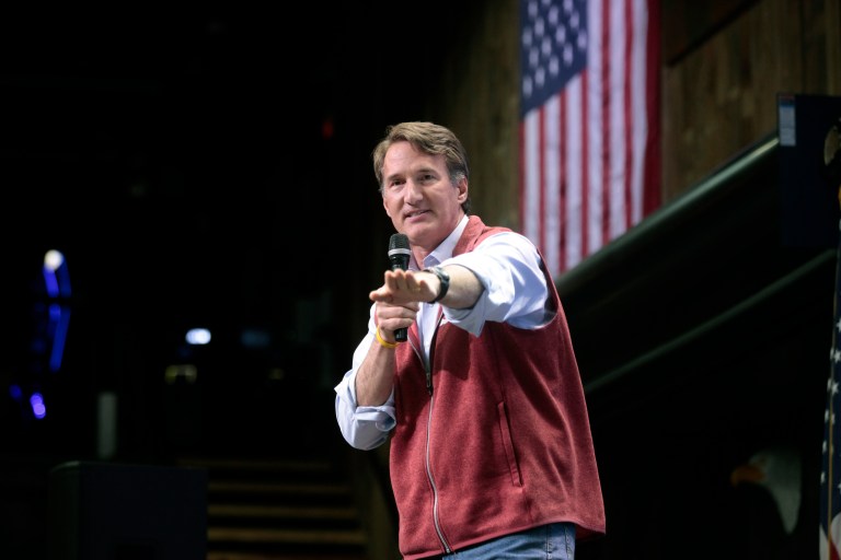 Virginia Gov. Glenn Youngkin speaks during a campaign rally for Gov. Kristi Noem on Nov. 2 in Sioux Falls, S.D. 