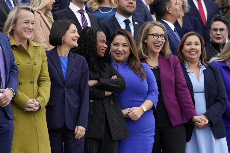 Rep.-elect Nikki Budzinski, D-Ill., from left, Rep.-elect Becca Balint, D-Vt., Rep.-elect Summer Lee, D-Pa., Rep.-elect Delia Ramirez, D-Ill., Rep.-elect Hillary Scholten, D-Mich., and Yadira Caraveo, Democratic candidate in Colorado's 8th Congressional District, stand for a class photo of newly elected members of Congress.