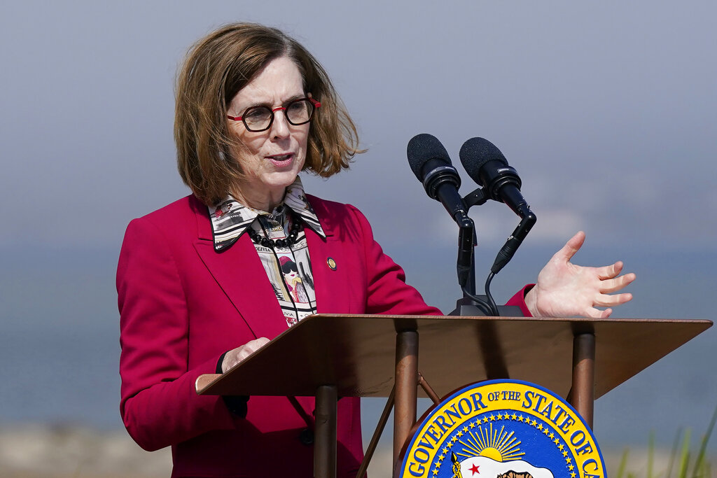 Oregon governor commutes ‘immoral’ sentences of all death row inmates in final days in office
