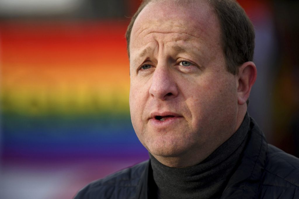Democratic Colorado governor defends busing immigrants to other states
