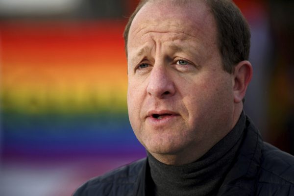 Democratic Colorado governor says state will no longer bus immigrants to cities