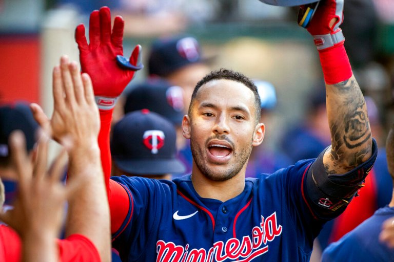 Carlos Correa playing for the Minnesota Twins in 2022. Correa signed a $350 million, 13-year contract with the San Francisco Giants.