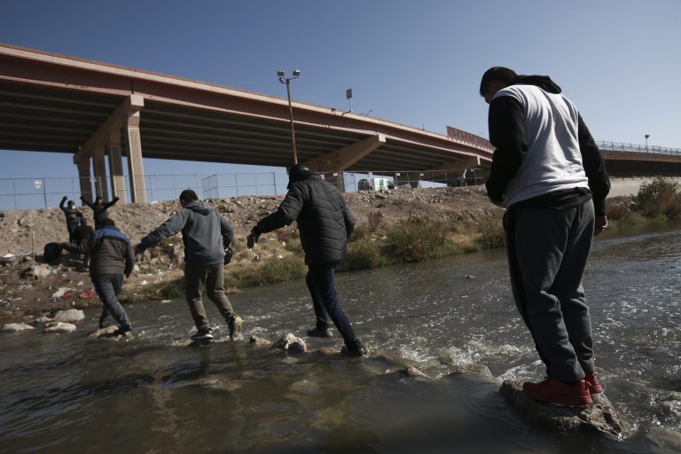 Migrants walk towards the U.S.-Mexico border in Ciudad Juarez, Mexico, Monday, Dec. 19, 2022.