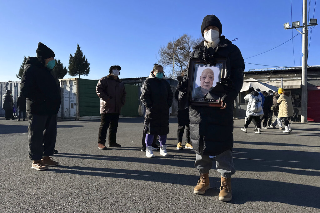 Long lines outside funeral homes as COVID-19 outbreak in China intensifies