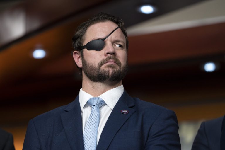 Rep. Dan Crenshaw (R-TX) attends a news conference with Republicans, mainly veterans and medical professionals, who support Rep. Kevin McCarthy, R-Calif., for Speaker of the House, Wednesday, Jan. 4, 2023, on Capitol Hill in Washington.