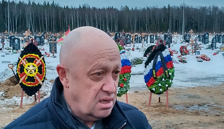 Wagner Group head Yevgeny Prigozhin attends the funeral of Dmitry Menshikov, a fighter of the Wagner group who died during a special operation in Ukraine, at the Beloostrovskoye cemetery outside St. Petersburg, Russia, Saturday, Dec. 24, 2022.