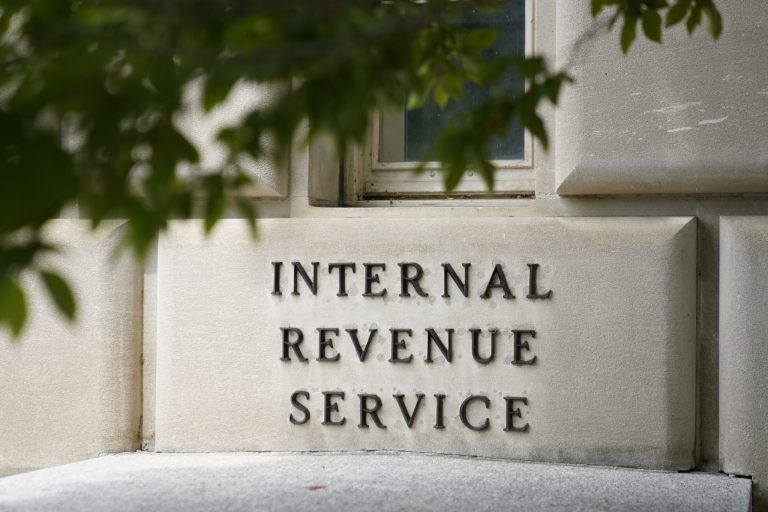 FILE - A sign outside the Internal Revenue Service building in Washington, on May 4, 2021. (AP Photo/Patrick Semansky, File)