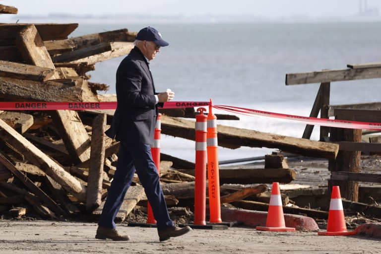 President Joe Biden tours the damage done to Seacliff Pier and Seacliff State Beach in Aptos, Calif., on Thursday, Jan. 19, 2023, while on a tour to assess damage caused by a series of major storms. 
