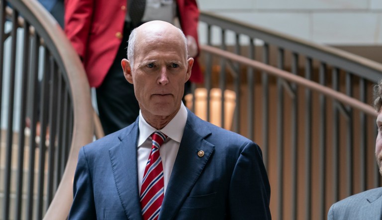 Sen. Rick Scott heads to a classified briefing on China, at the Capitol in Washington, Wednesday, Feb. 15, 2023. 