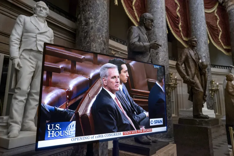 A monitor in Statuary Hall displays House Republican Leader Kevin McCarthy, R-Calif., as he sits in the chamber at the start of a tenth ballot to elect a speaker of the House, at the Capitol in Washington, Jan. 5, 2023. 