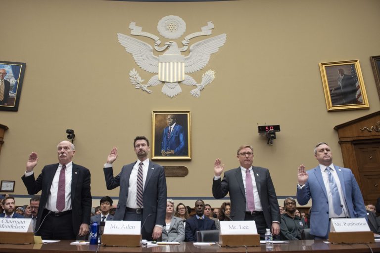Members of the Washington, D.C. government are sworn-in before testifying during a House Oversight and Accountability Committee's hearing about Congressional oversight of the Nation's Capital, Wednesday, March 29, 2023, on Capitol Hill in Washington. From left; D.C. Council Chairman Phil Mendelson, Council Member Charles Allen, CFO Glen Lee, and D.C. Police Union Chairman Greggory Pemberton. 