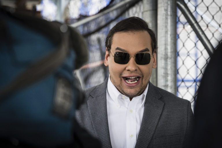 Rep. George Santos, R-N.Y., walks past the criminal courthouse at 100 Center Street in New York on Tuesday, April 4, 2023.