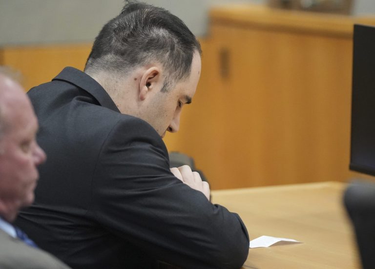 U.S. Army Sgt. Daniel Perry closes his eyes and bows his head moments before he was convicted of murder in the killing of Garrett Foster, an armed protester in 2020 during nationwide protests against police violence and racial injustice, Friday, April 7, 2023, at the Blackwell-Thurman Criminal Justice Center in Austin, Texas. 