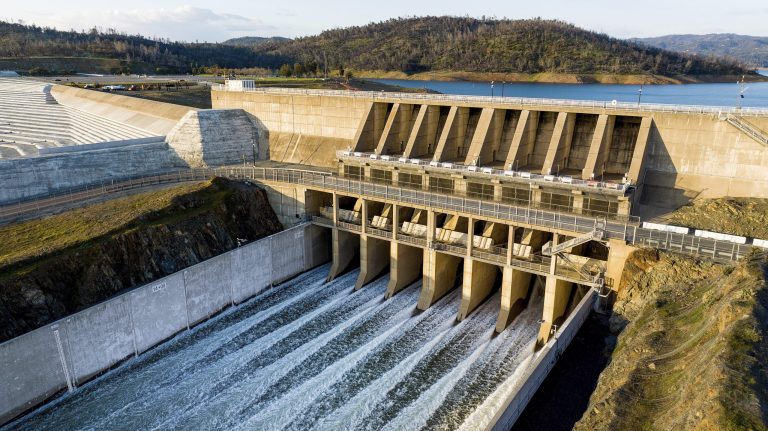 Water flows through the Oroville Spillway at Lake Oroville on Saturday, March 25, 2023, in Butte County, Calif. The California Department of Water Resources was releasing water to create room at the reservoir for anticipated snowpack melt. At the time of this photo, the reservoir stood at 82 percent of capacity and 118 percent of its historical average. 