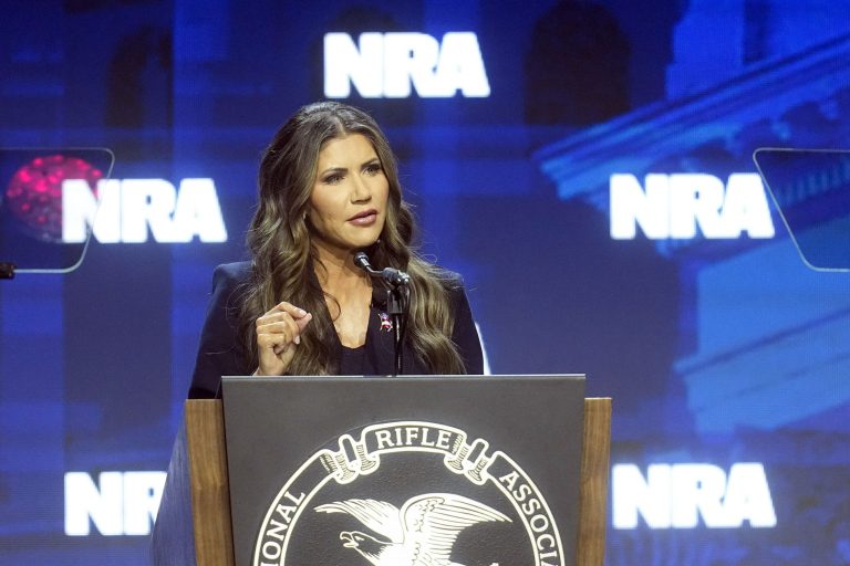 South Dakota Gov. Kristi Noem speaks at the National Rifle Association Convention, Friday, April 14, 2023, in Indianapolis. 