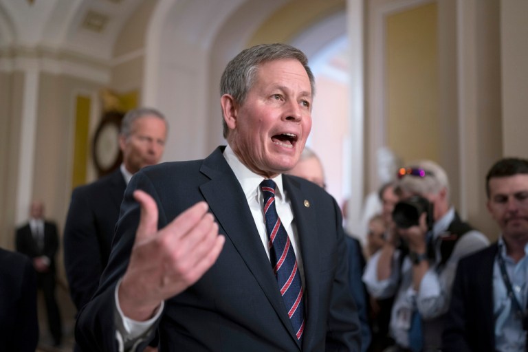 Sen. Steve Daines, R-Mont., speaks to reporters after the Republican leadership held a closed-door strategy session, at the Capitol in Washington, Tuesday, April 18, 2023.