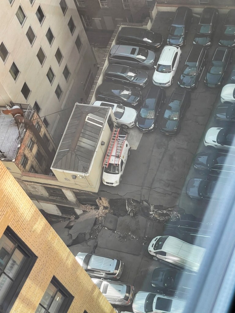 This photo provided by Charlie Franklin shows a partially collapsed parking garage in lower Manhattan's Financial District on Tuesday, April 18, 2023, in New York City. (Charlie Franklin via AP)