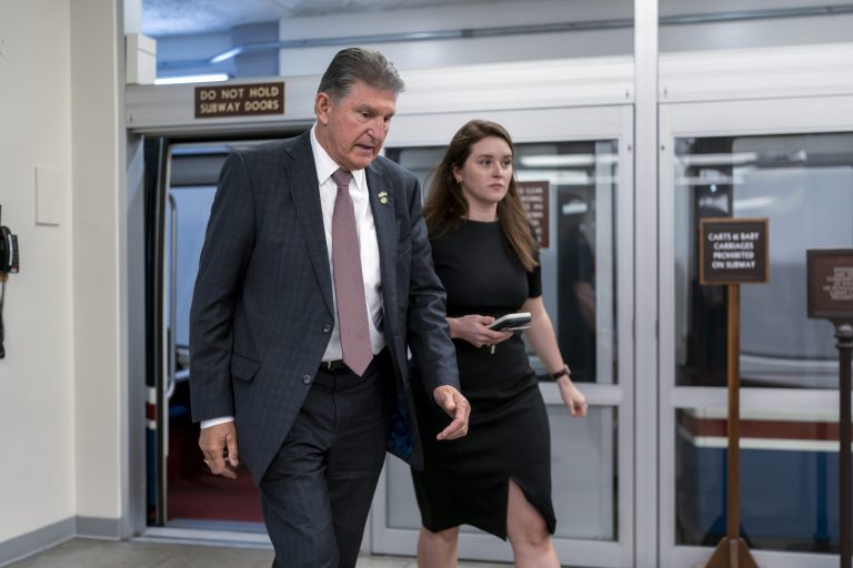 Sen. Joe Manchin, D-W.Va., chair of the Senate Energy and Natural Resources Committee, heads to the chamber as senators arrive for the final votes of the week, at the Capitol in Washington, Thursday, May 4, 2023. 