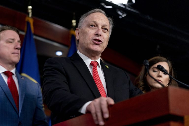 Rep. Andy Biggs, R-Ariz., accompanied by fellow House Republicans, speaks during a news conference on the House Republican's investigation into the Biden Family on Capitol Hill in Washington, Wednesday, May 10, 2023. 