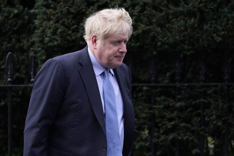 Boris Johnson leaves his house in London.