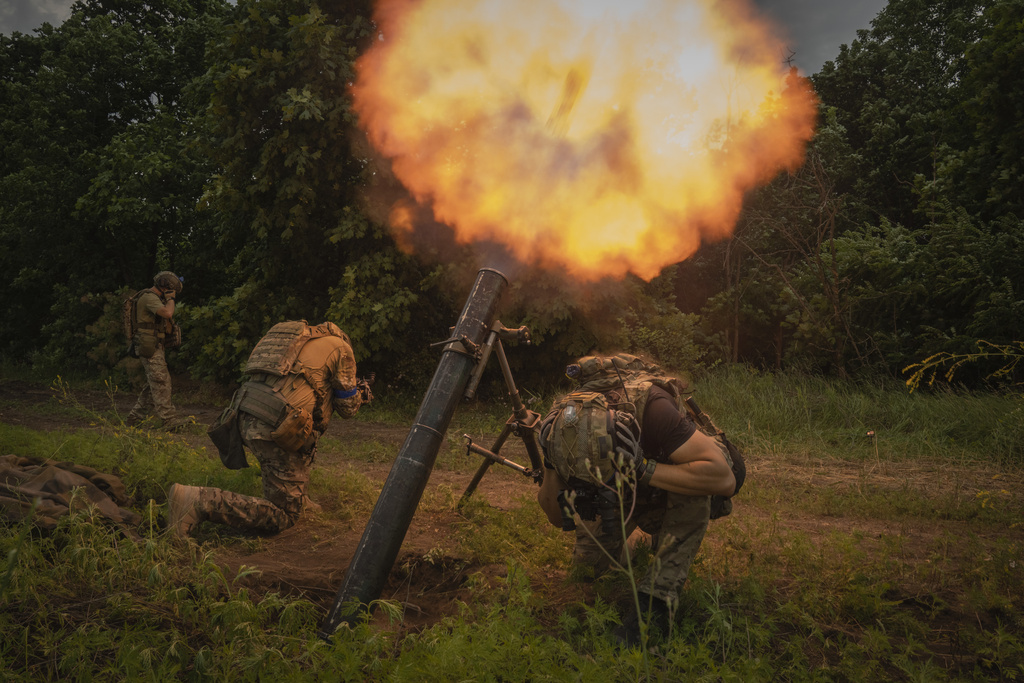 Ukrainian soldiers fire toward the Russian position on the front line in the Zaporizhzhia region on Saturday, June 24, 2023. 