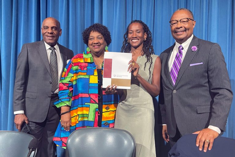 From left, State Sen. Steven Bradford, Secretary of State Shirley Weber, task force member Lisa Holder and Assemblymember Reggie Jones-Sawyer hold up a final report of the California Task Force to Study and Develop Reparation Proposals for African Americans during a hearing in Sacramento, Calif., Thursday, June 29, 2023. 
